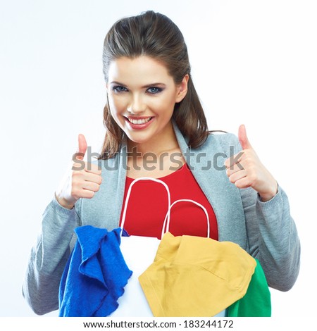 Laundry cleaning housewife show thumb up. Isolated caucasian woman.