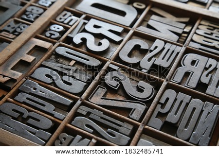 Wooden letters in a box