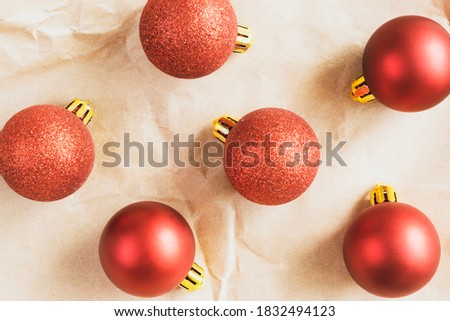 A pattern of Christmas ornaments. Christmas ornaments on crumpled paper background.