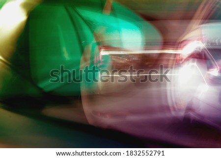 Road traffic, view from the car. Original light painting, long exposure. Abstract photography.