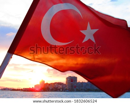 Turkey flag in sun sets background. The picture taken in Izmir during summer