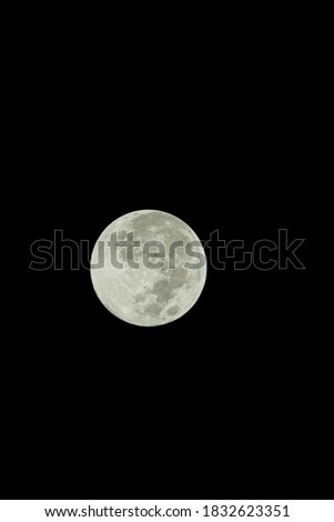 Close up picture of the shiny full moon during nighttime