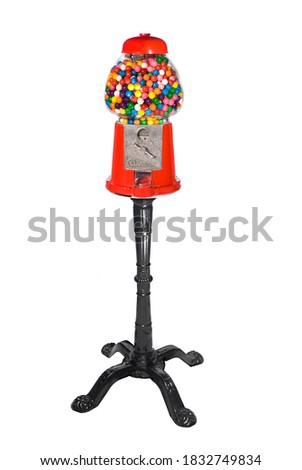 Gumball vending machine filled with colorful gumballs isolated on white Royalty-Free Stock Photo #1832749834