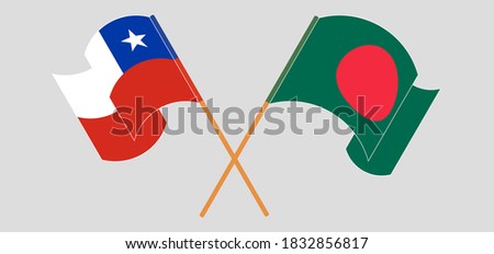Crossed and waving flags of Bangladesh and Chile