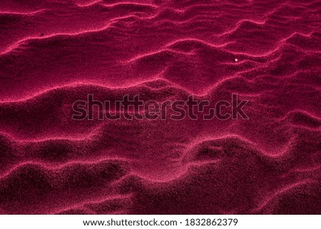Dark crimson desert background and texture