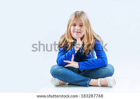 Smiling girl sitting