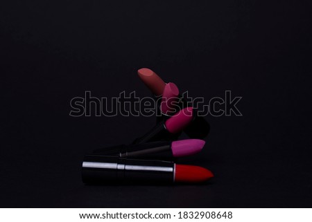 stack of lipsticks fanning out 
