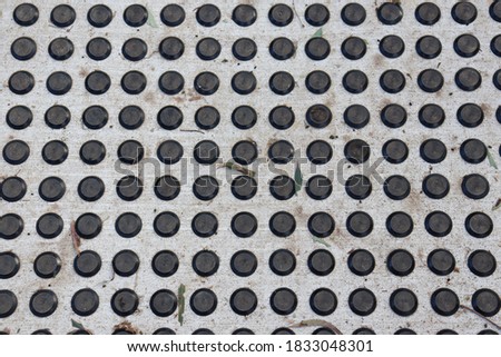 full frame black grid of circles