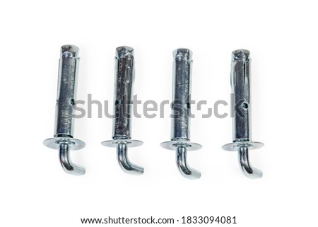 Wall anchor bolts wedge type with right angle hooks with zinc coating on a white background, top view 
