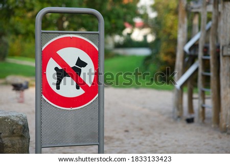 No dogs sign in playgrounds