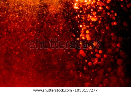 Red bokeh of lights with black background