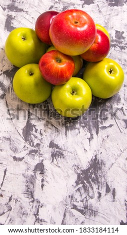 A bunch of red and green apples on a black and white background,close-up,background,Wallpaper,postcard,advertising
