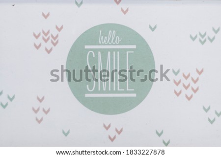 Decorative home painting with pastel color patterns and positive Hello Smile text