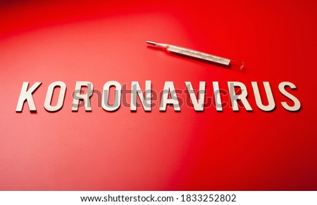 koronavirus norsk norwegian word text wooden letter on red background corona virus covid-19 Royalty-Free Stock Photo #1833252802
