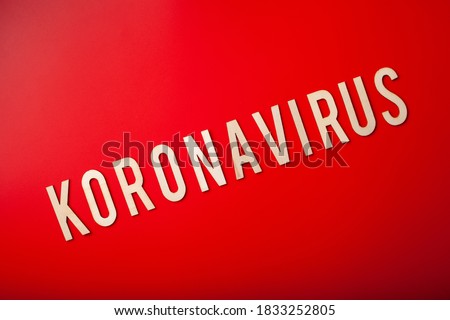 koronavirus norsk norwegian word text wooden letter on red background corona virus covid-19 Royalty-Free Stock Photo #1833252805