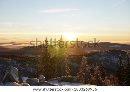 Sunrise in winter in the mountains