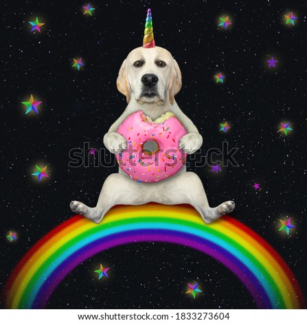 A dog unicorn sits on a rainbow and eats a pink donut.