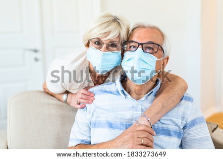 Senior couple wearing medical face mask and recovery from the illness at the home
