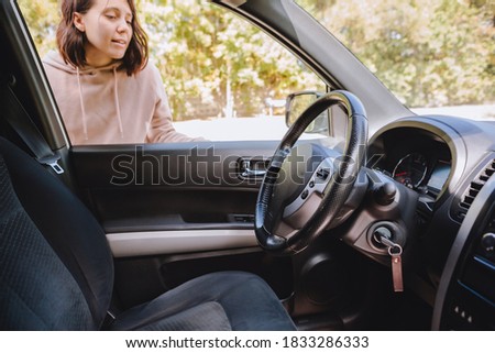 woman locked car and forget keys inside Royalty-Free Stock Photo #1833286333