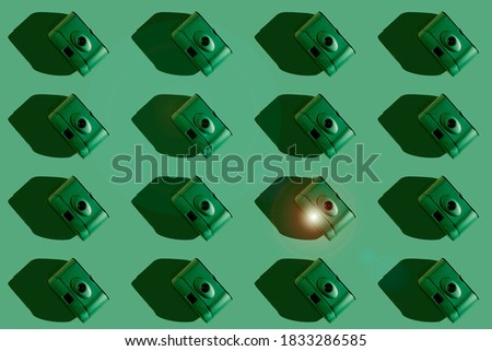 Vintage photo cameras pattern with green background