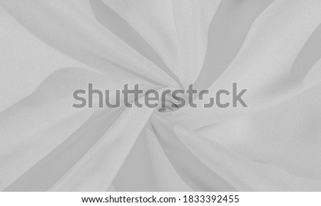 White silk fabric, smooth satin fabric. Texture, background, pattern