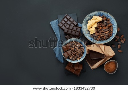 Delicious chocolate bars and pieces. Top view, copy space