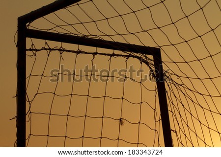 closeup goal net with the sunset,Silhouette