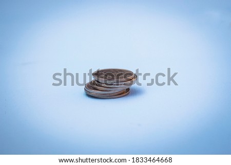 Cash coin on blue background