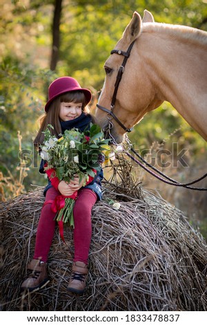 girl with a horse, girl with a bouquet of flowers and a horse
