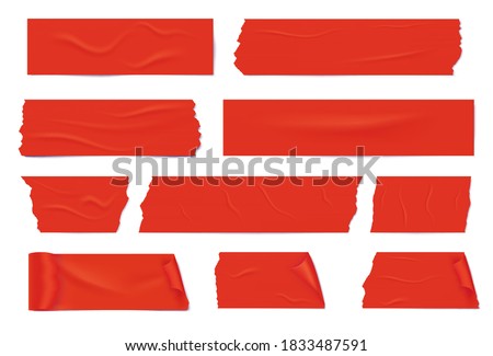 Slices of a red adhesive tape with shadow and wrinkles. Royalty-Free Stock Photo #1833487591