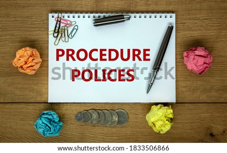 White note with inscription 'procedure, polices' on beautiful wooden table, colored paper, metalic pen. Business concept.
