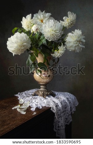 Still life with a bouquet of white dahlia