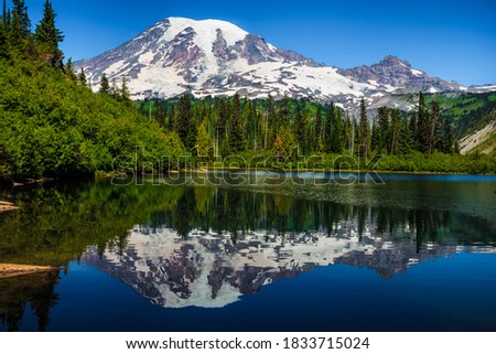 Beautful Reflection of Mt Rainier from Bench Lake in Mt Rainier National Park, Washington Royalty-Free Stock Photo #1833715024