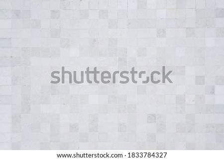 Full frame shot of beautiful white and gray tile pattern of wall. Wallpaper and background concept.