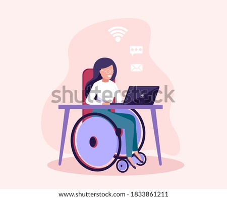 Disabled young woman in wheelchair working with computer online. Physical disability and society.