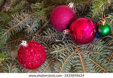 Christmas tree realistic decor. Green branches of a Christmas tree and balloons . Merry Christmas background for holiday banners, headlines, posters. New Year.