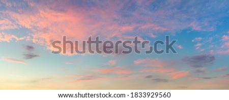 Colorful Panoramic view of  Sunset  Sunrise Sundown Sky with light clouds, panorama Royalty-Free Stock Photo #1833929560