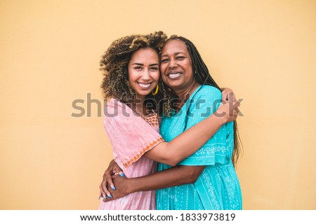 Portrait of cheerful african mother and adult daughter together - Family, mother and child love Royalty-Free Stock Photo #1833973819