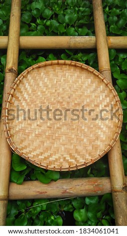 Tampah Tambir is a place with a round shape made of woven bamboo