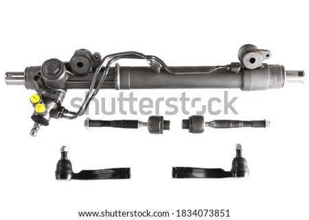 Power steering rack with a tie rods and a tie rods ends isolated over white background Royalty-Free Stock Photo #1834073851