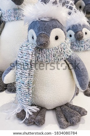 A penguin stuffed toy Christmas decor.