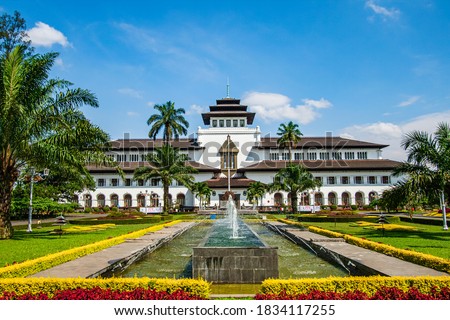 Gedung Sate is a public building in Bandung, West Java, Indonesia. It was designed according to a neoclassical design incorporating native Indonesian.  Royalty-Free Stock Photo #1834117255
