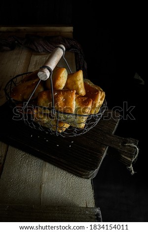 Odading or Bolang-baling is a typical Indonesian fried bread from Bandung. Darkmood photo stock