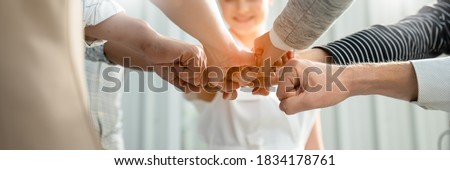 Teamwork,partnership and Social connection in business join hand together concept.Hand of diverse people connecting.Power of volunteer charity work, Stack of people hand.