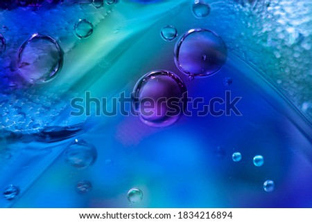  macro Photo of Colored Bubbles in Corner of Glass of Drink