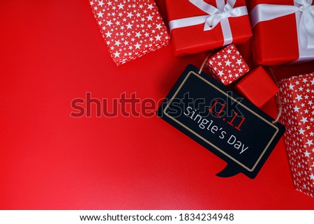 Online shopping of China, 11.11 single's day sale concept. The red gift boxes on red background with copy space for text 11.11 single's day sale.