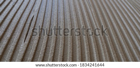 cementitious adhesive applied to the floor ready to receive the ceramic tile
 Royalty-Free Stock Photo #1834241644