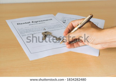 Signing  new rental agreement contract 