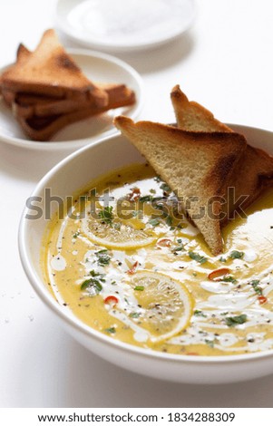 Pumpkin Soup. Healthy Homemade Vegetable Spicy Soup Served with Crunchy Toasts. 