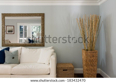 Living room interior with couch and basket. Royalty-Free Stock Photo #183432470